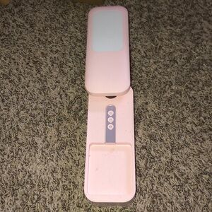Used Pink phone holder